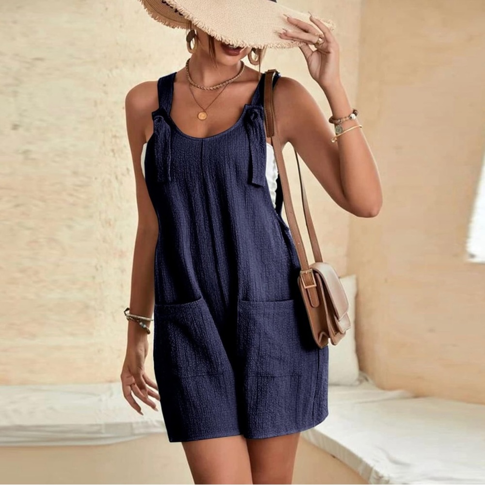 Dark blue romper w/pockets size medium